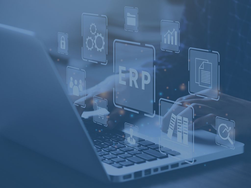 Hands on Laptop with ERP Icons Overlay