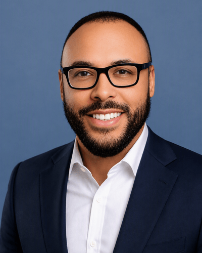 Professional headshot photo of Ed Muldrow