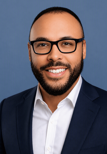 Professional headshot photo of Ed Muldrow
